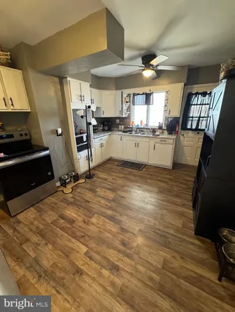 a view of kitchen and dining room