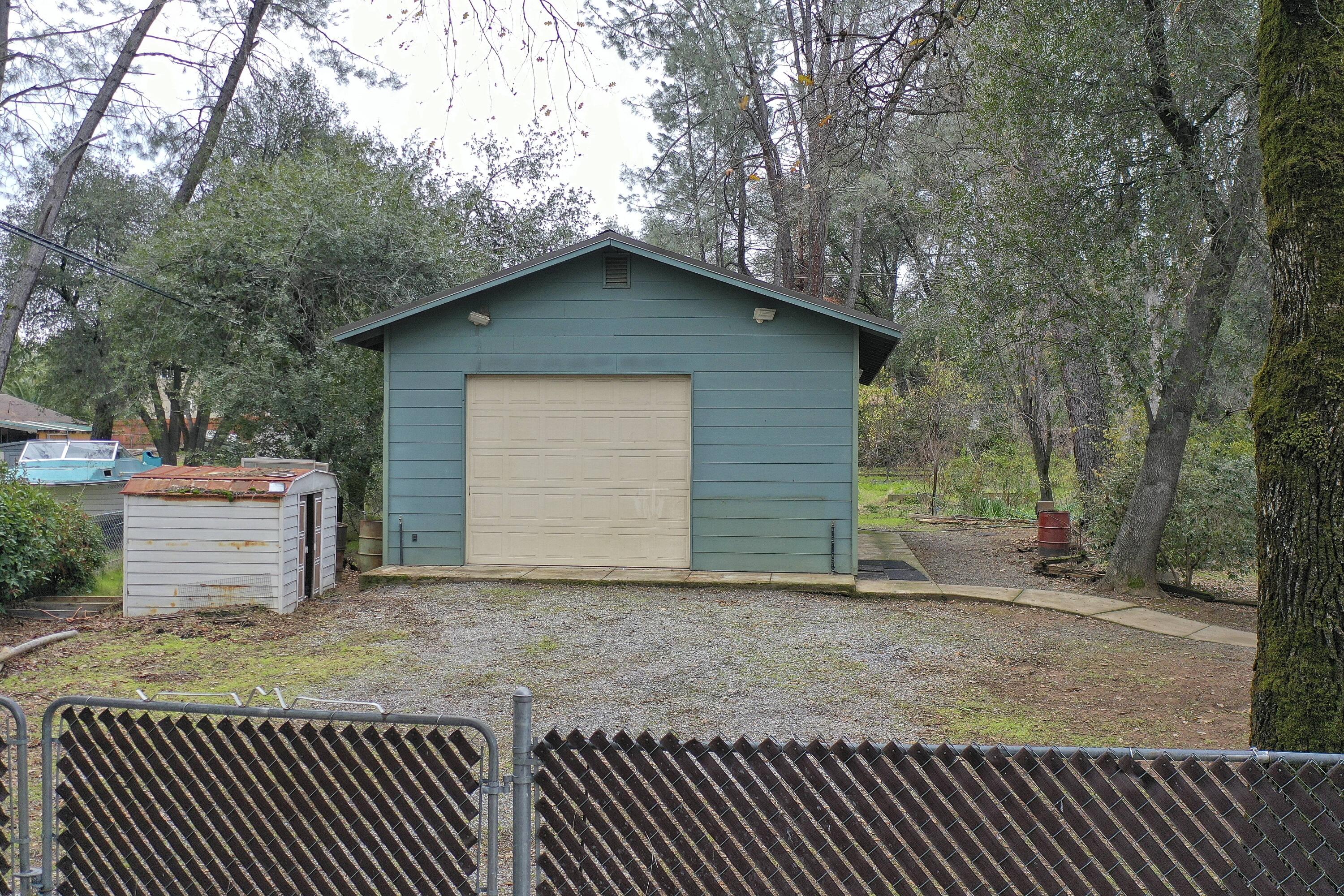 8440 Redbank Road Redding, CA 96001 - Photo 11 of 49 a view of a house with a yard