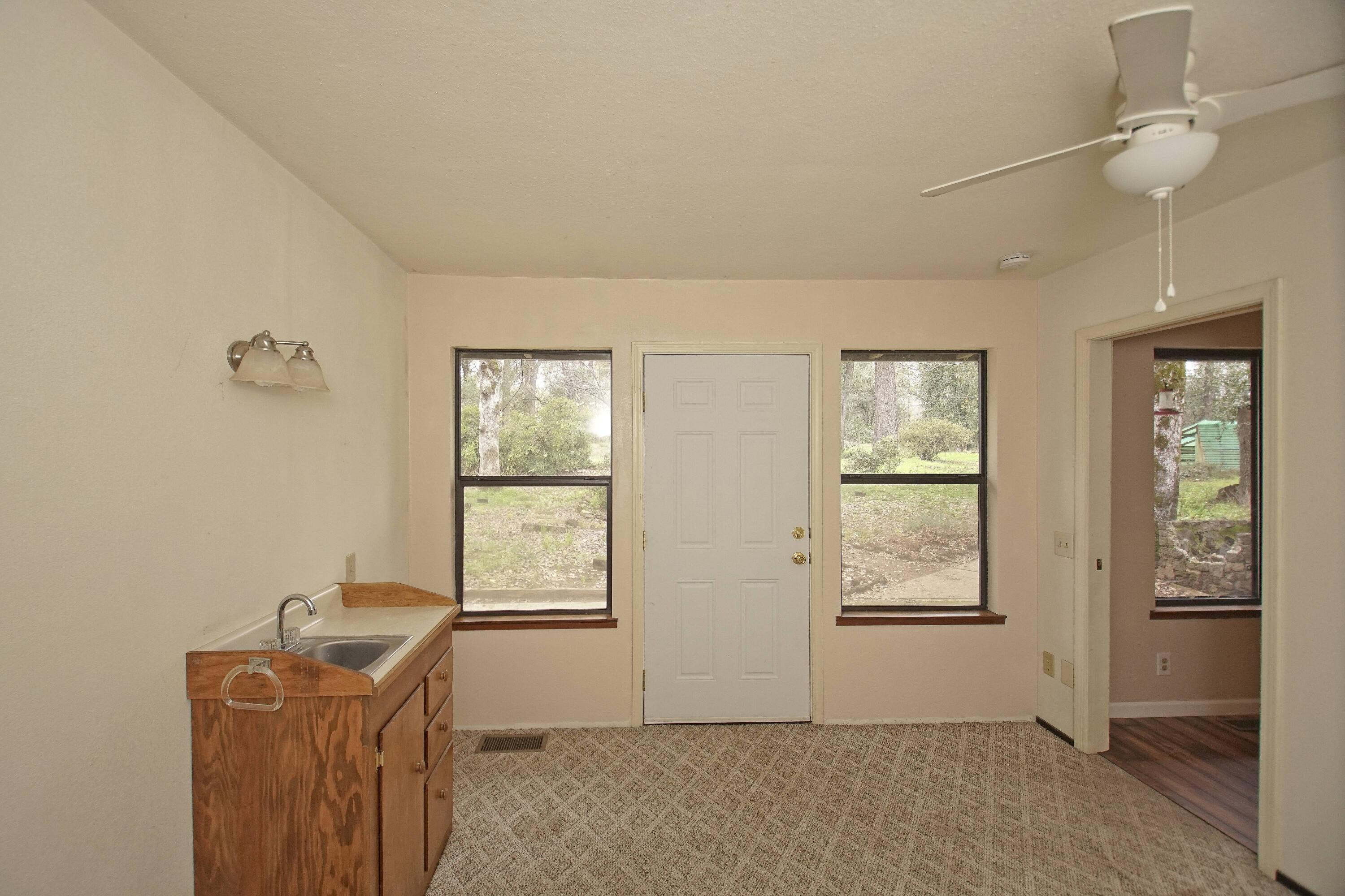 8440 Redbank Road Redding, CA 96001 - Photo 39 of 49 an empty room with windows