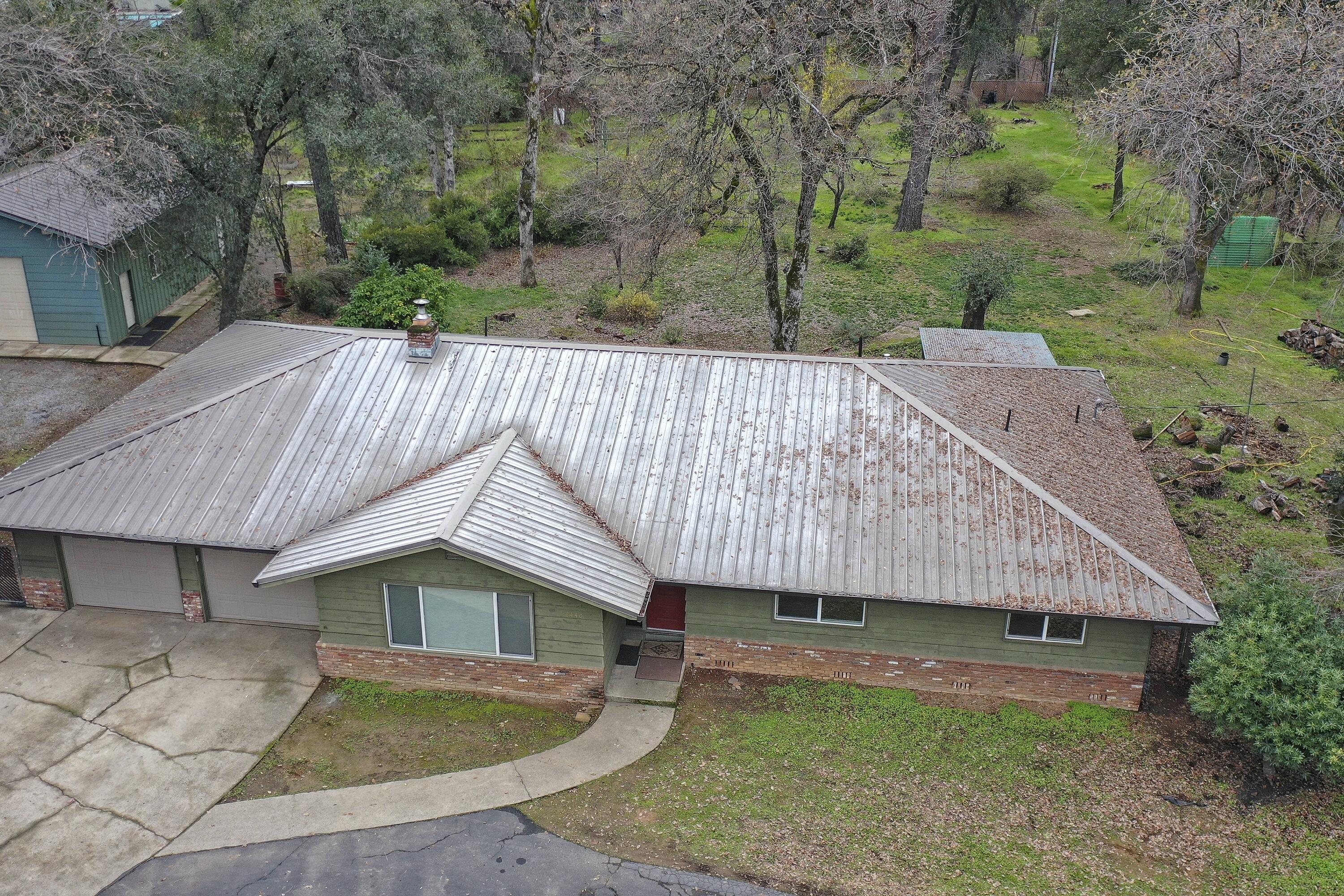 8440 Redbank Road Redding, CA 96001 - Photo 5 of 49 a aerial view of a house with a yard balcony and tree