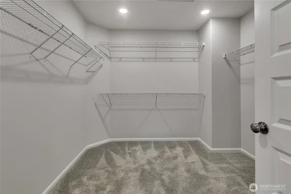 a view of a room with racks on the wall