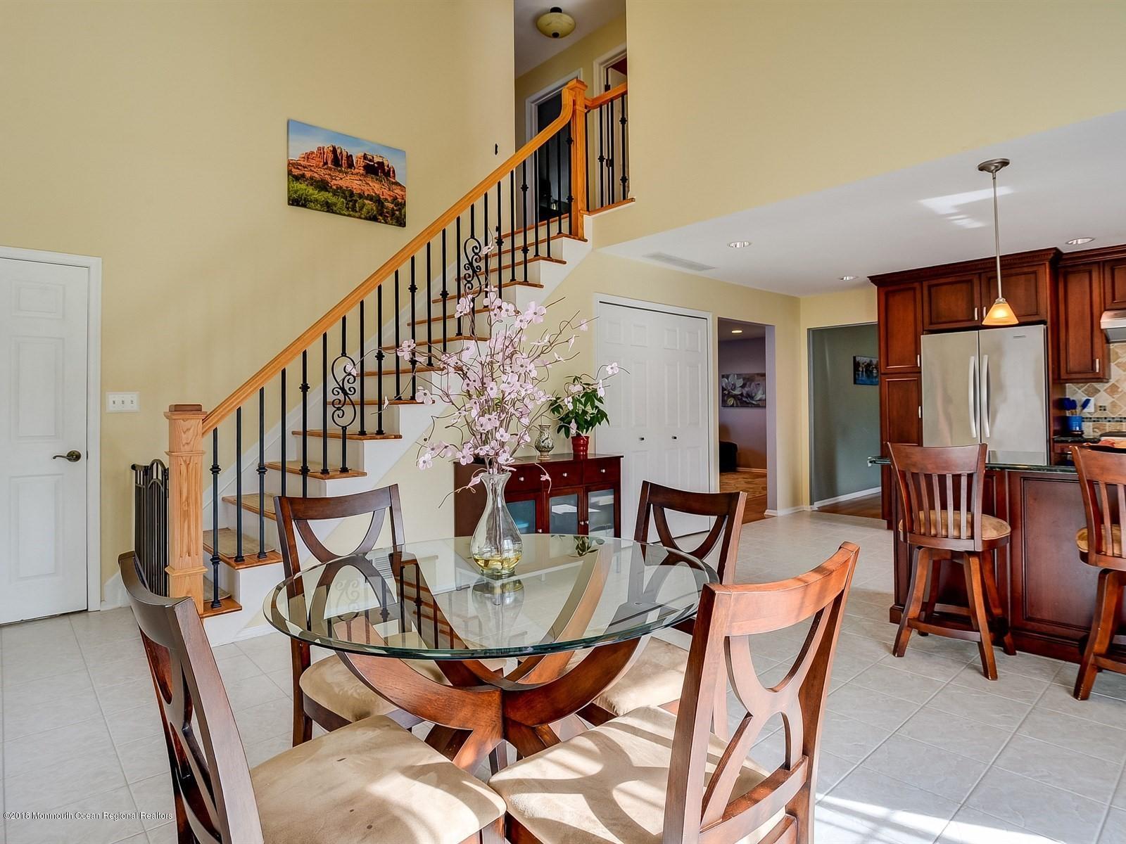 13 Hamilton Road Englishtown, NJ 07726 - Photo 11 of 24 a view of a dining room with furniture window and wooden floor