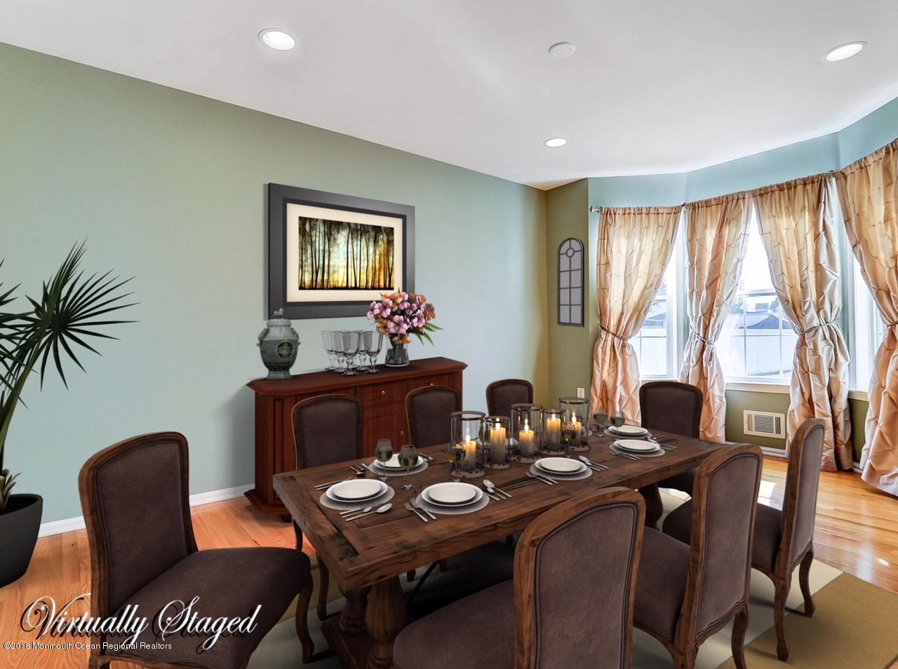 13 Hamilton Road Englishtown, NJ 07726 - Photo 12 of 24 a dining room with furniture and window