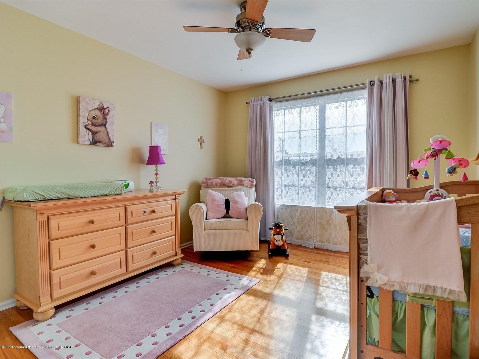 13 Hamilton Road Englishtown, NJ 07726 - Photo 19 of 24 a bed room with a bed and a window