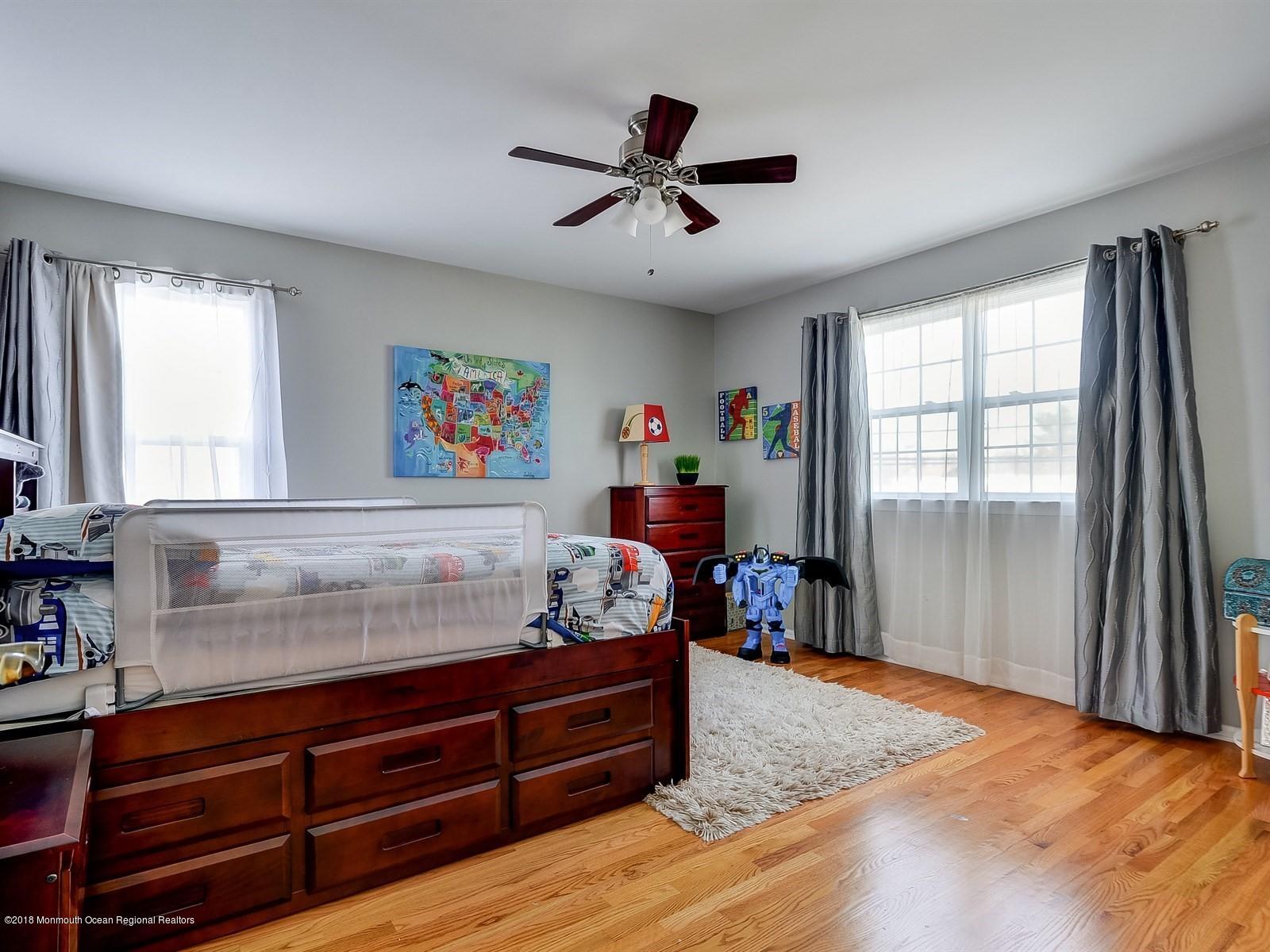 13 Hamilton Road Englishtown, NJ 07726 - Photo 20 of 24 a living room with furniture and a window