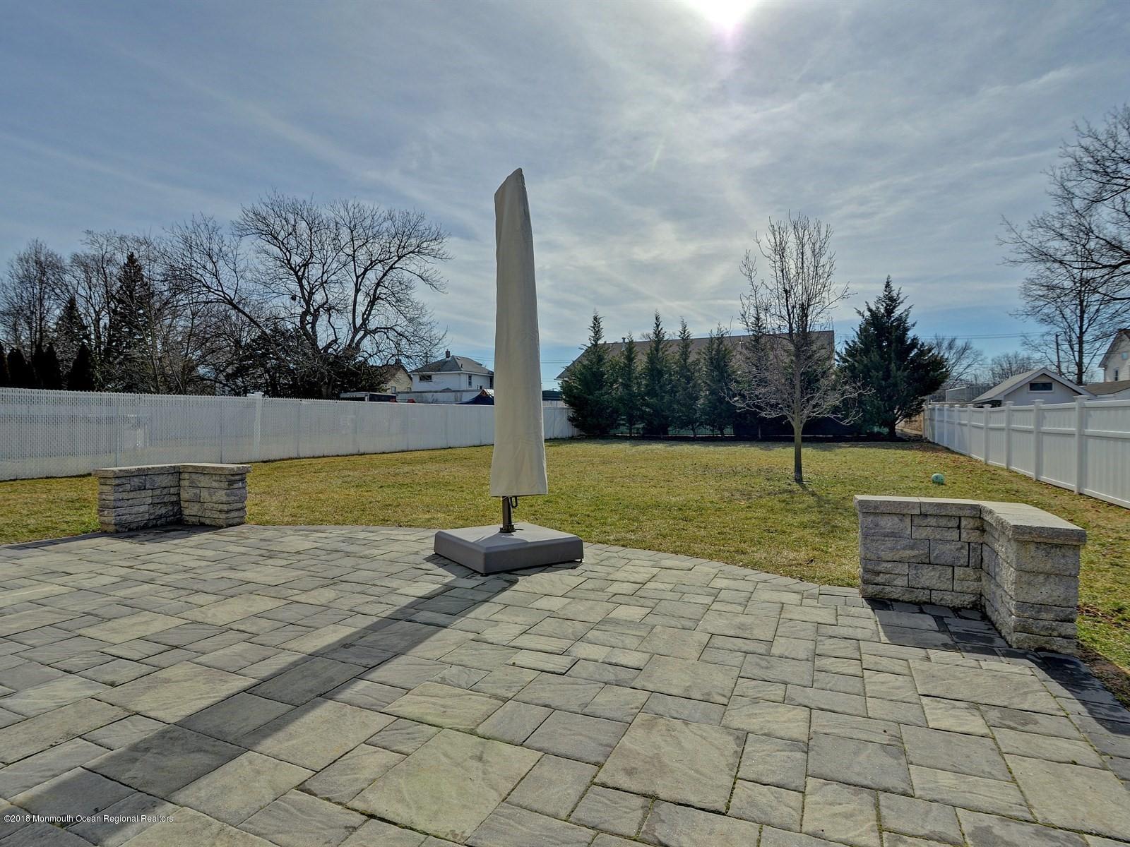 13 Hamilton Road Englishtown, NJ 07726 - Photo 23 of 24 a view of a swimming pool with a yard