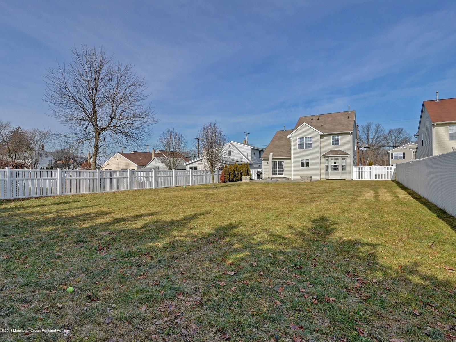 13 Hamilton Road Englishtown, NJ 07726 - Photo 24 of 24 a house view with swimming pool in front of it