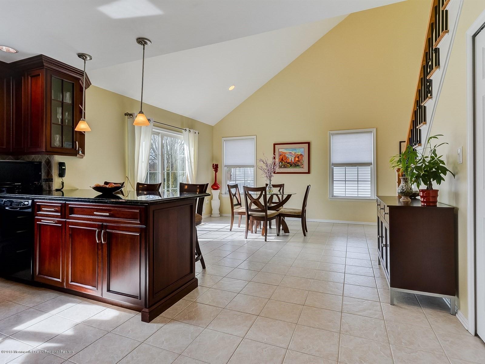 13 Hamilton Road Englishtown, NJ 07726 - Photo 5 of 24 a living room with furniture a piano and a window