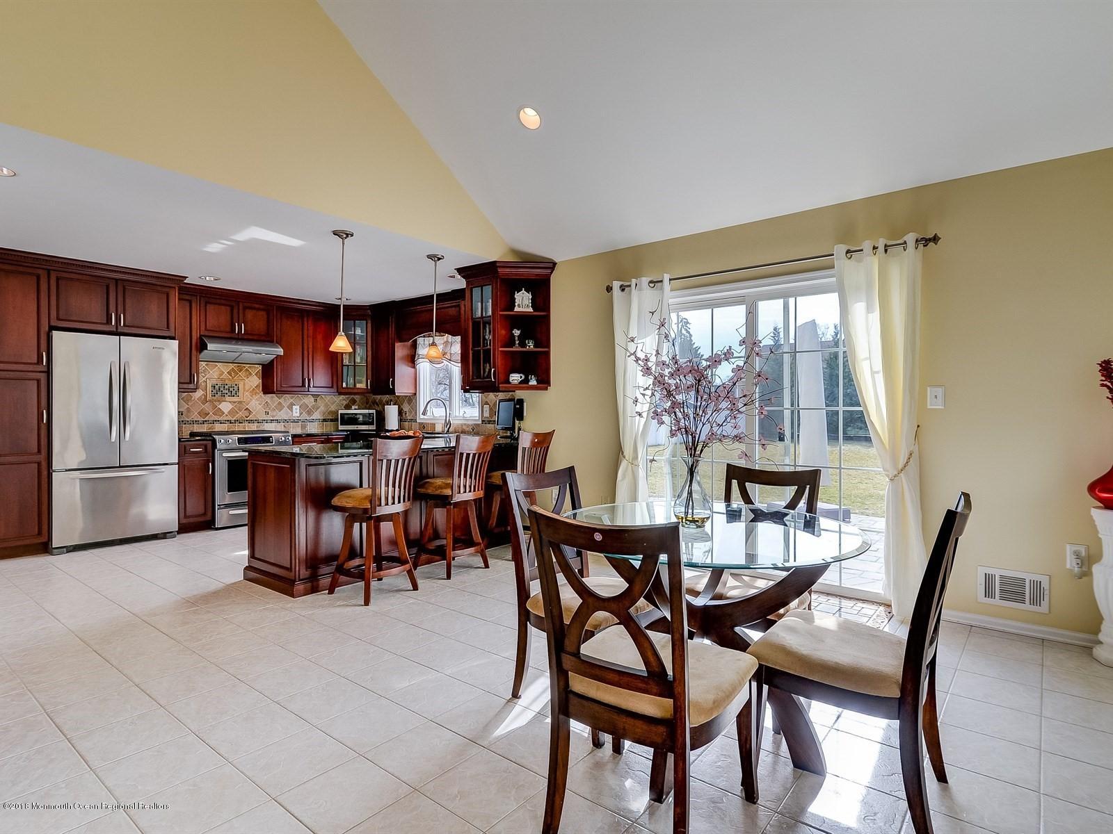 13 Hamilton Road Englishtown, NJ 07726 - Photo 9 of 24 a view of a dining room with furniture window and outside view