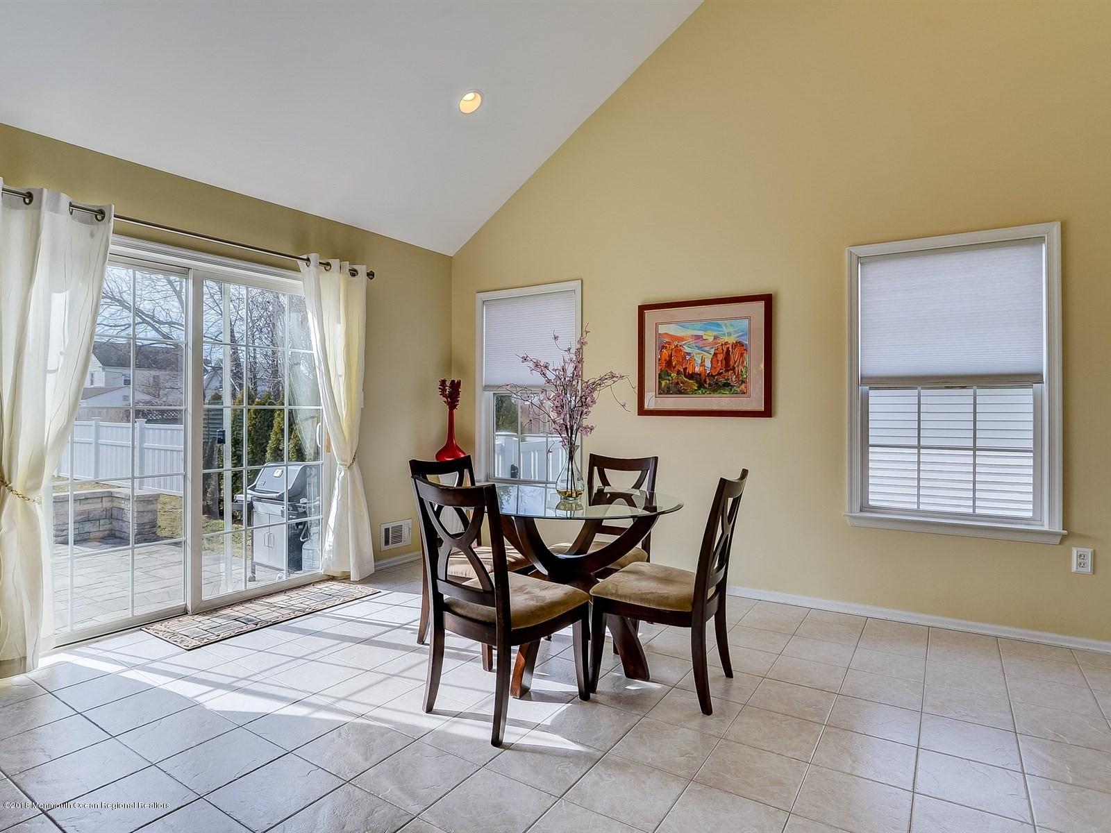 13 Hamilton Road Englishtown, NJ 07726 - Photo 10 of 24 a view of a dining room with furniture and window