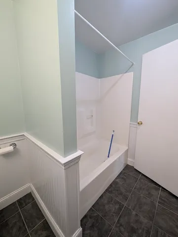 a bathroom with a sink and vanity