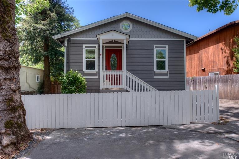 6 Spruce Road Fairfax, CA 94930 - Photo 1 of 1 a front view of a house with a fence