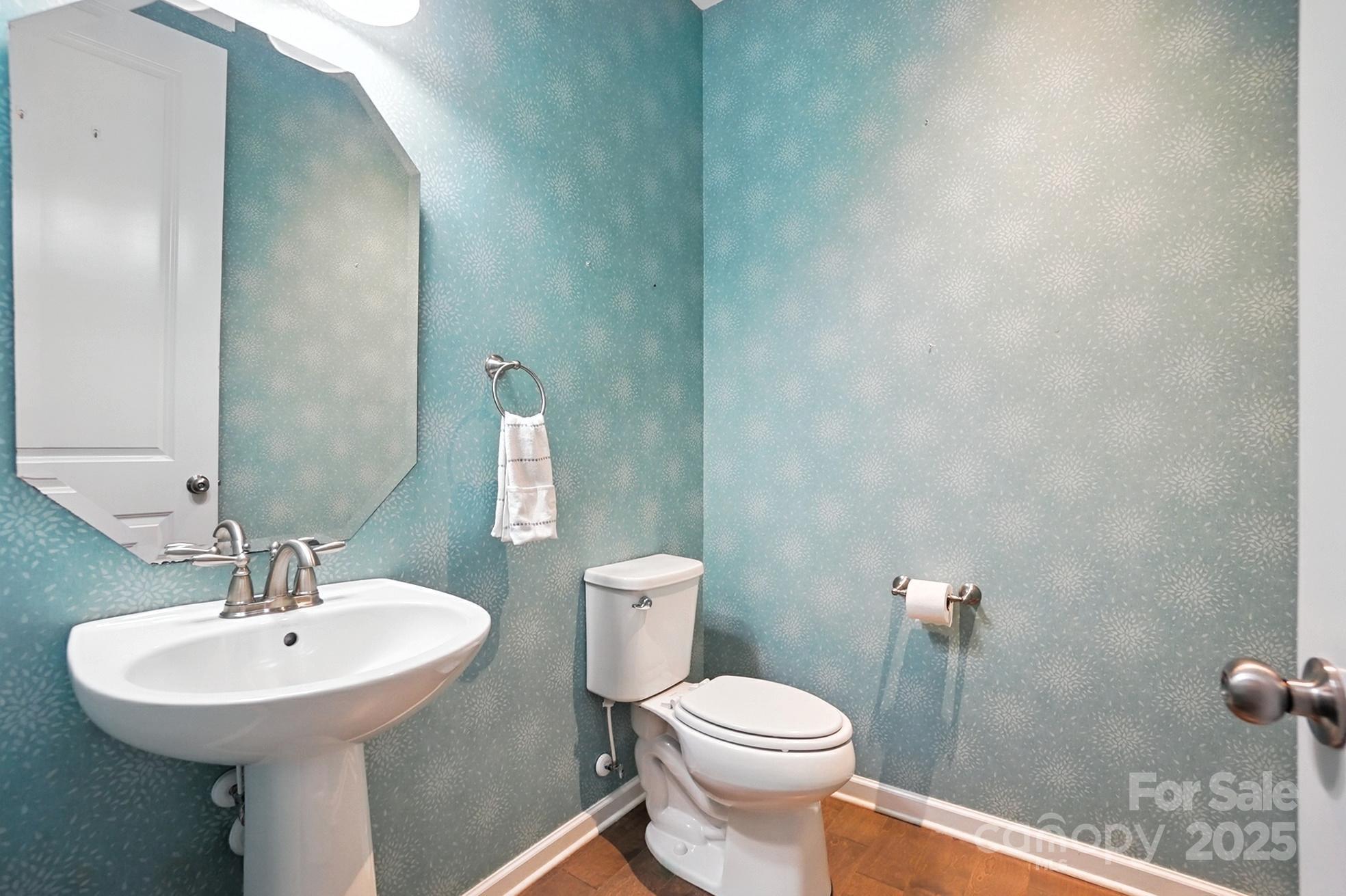 809 Ayrshire Avenue Fort Mill, SC 29708 - Photo 22 of 48 a bathroom with a sink a toilet and a mirror