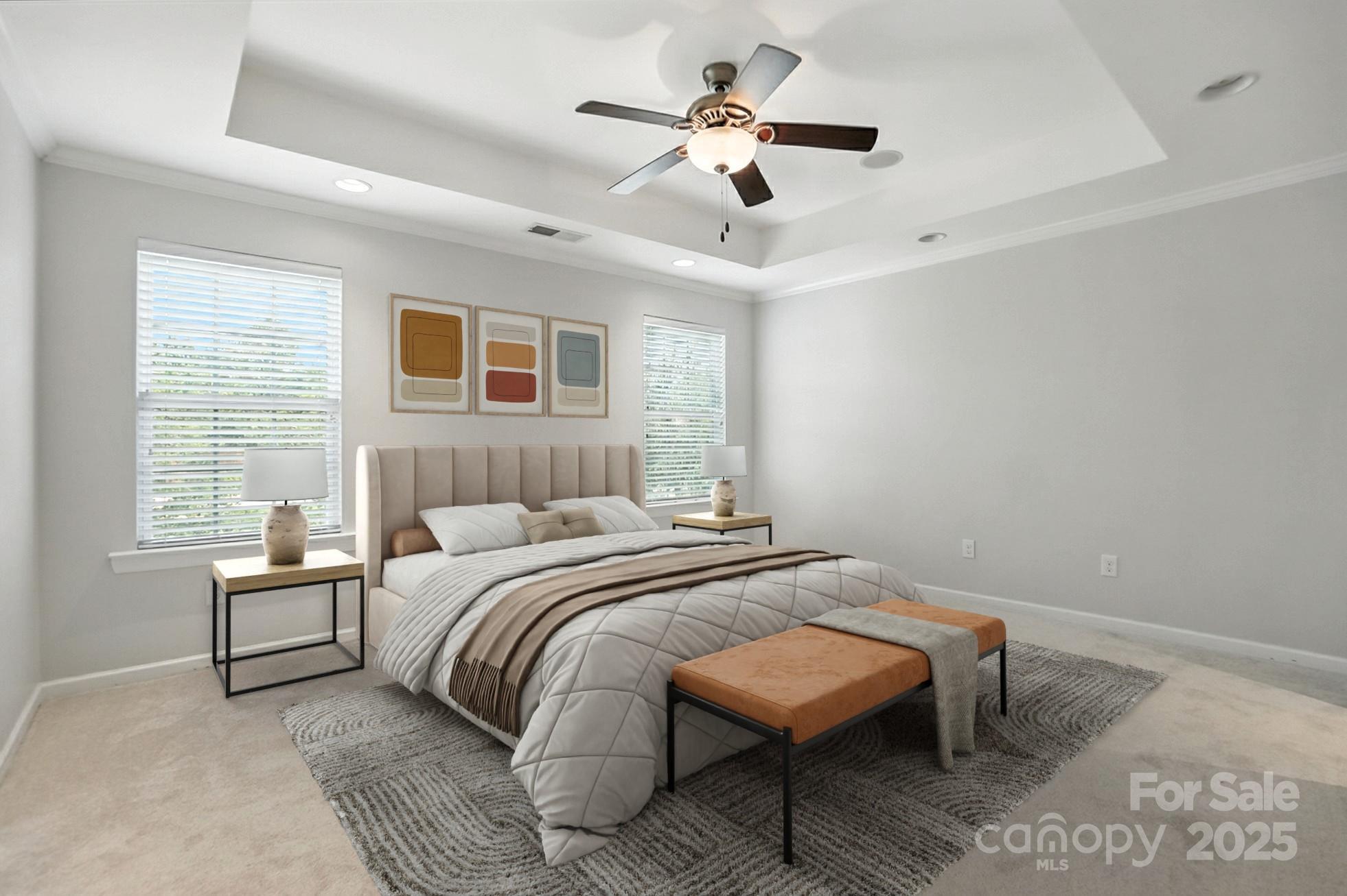 809 Ayrshire Avenue Fort Mill, SC 29708 - Photo 25 of 48 a bedroom with a bed and a chandelier