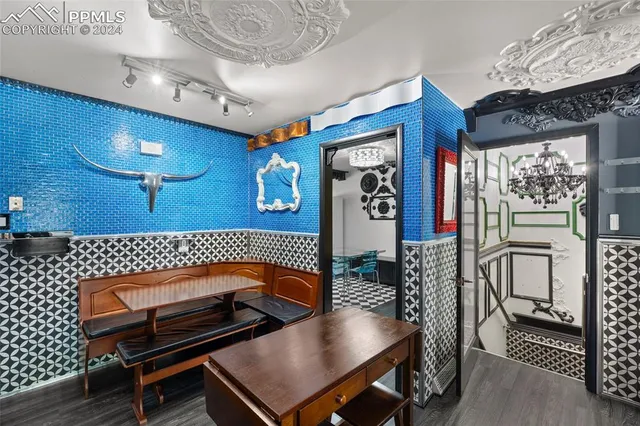 a room with furniture and wooden floor