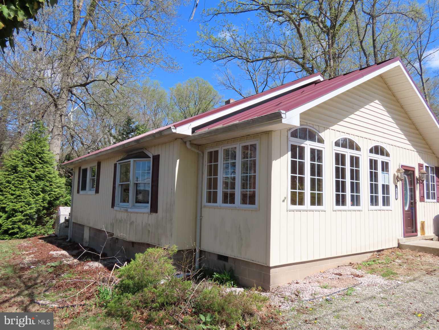 75 Elkside Road Elkton, MD 21921 - Photo 3 of 10 a view of a white house with a large windows