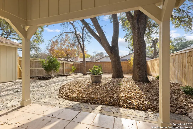 a view of a pathway of a house with a porch