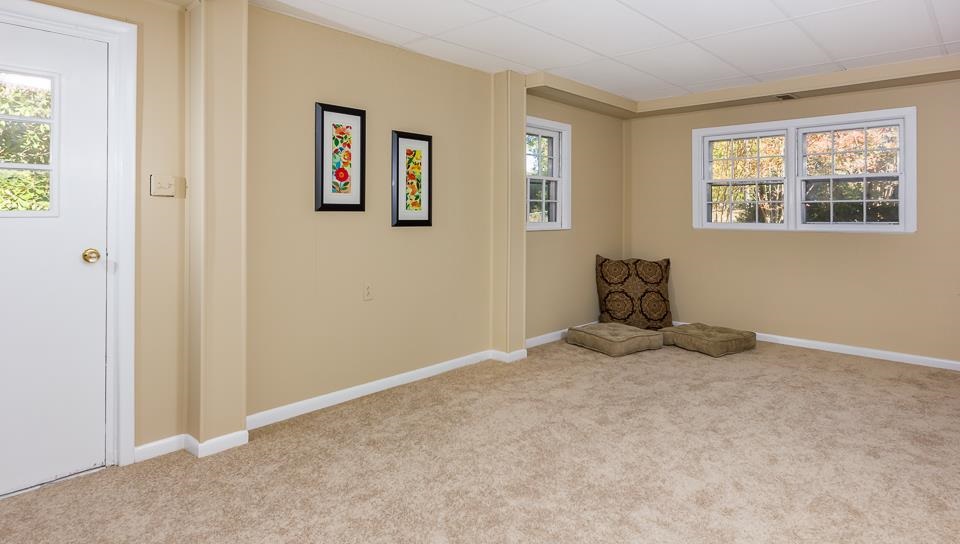 303 West Cornwall Road Cary, NC 27511 - Photo 18 of 22 a view of an empty room with a window