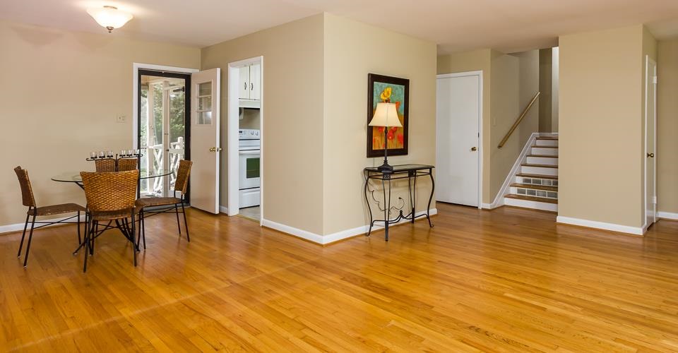 303 West Cornwall Road Cary, NC 27511 - Photo 3 of 22 a view of livingroom with furniture and wooden floor