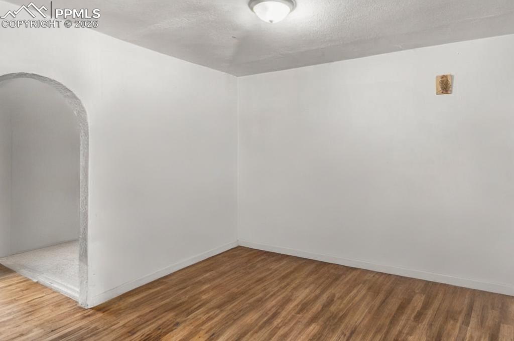 1246 Rio Grande Avenue Pueblo, CO 81006 - Photo 3 of 11 a view of small space with wooden floor