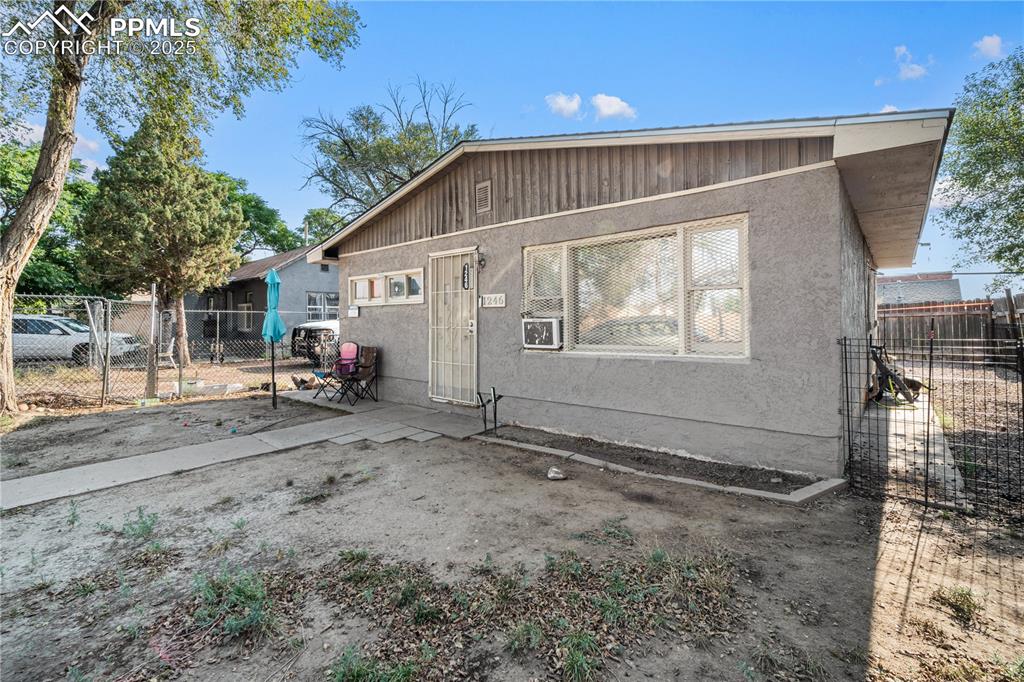 1246 Rio Grande Avenue Pueblo, CO 81006 - Photo 10 of 11 a view of a house with backyard
