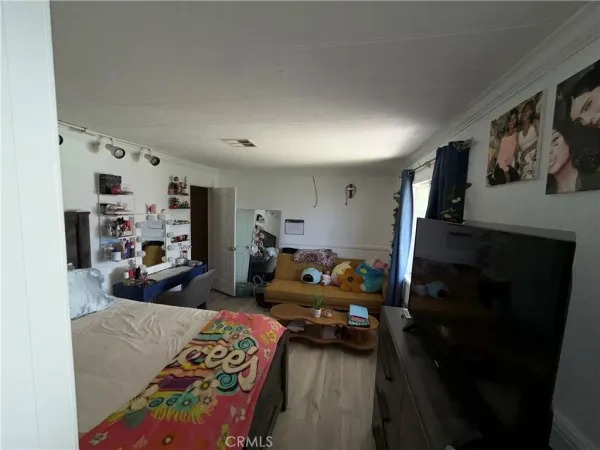 a bed room with furniture and a couch