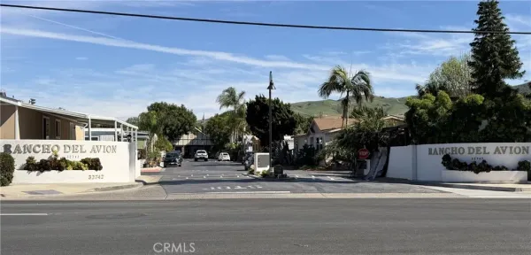 a view of a house with a street