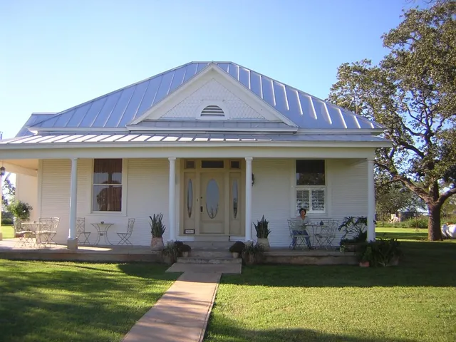 a front view of a house with patio
