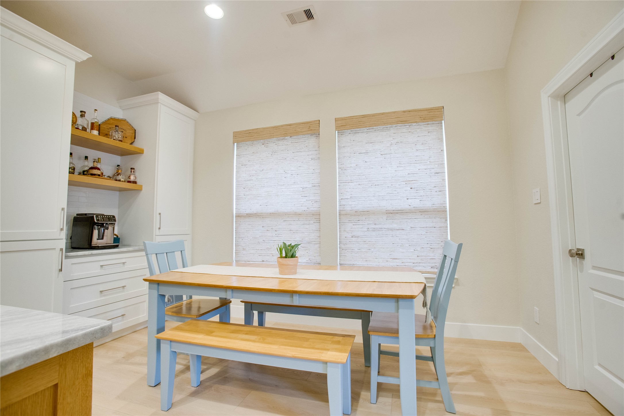 30 Fraiser Fir Place Spring, TX 77389 - Photo 13 of 35 a view of a dining room with furniture and a potted plant