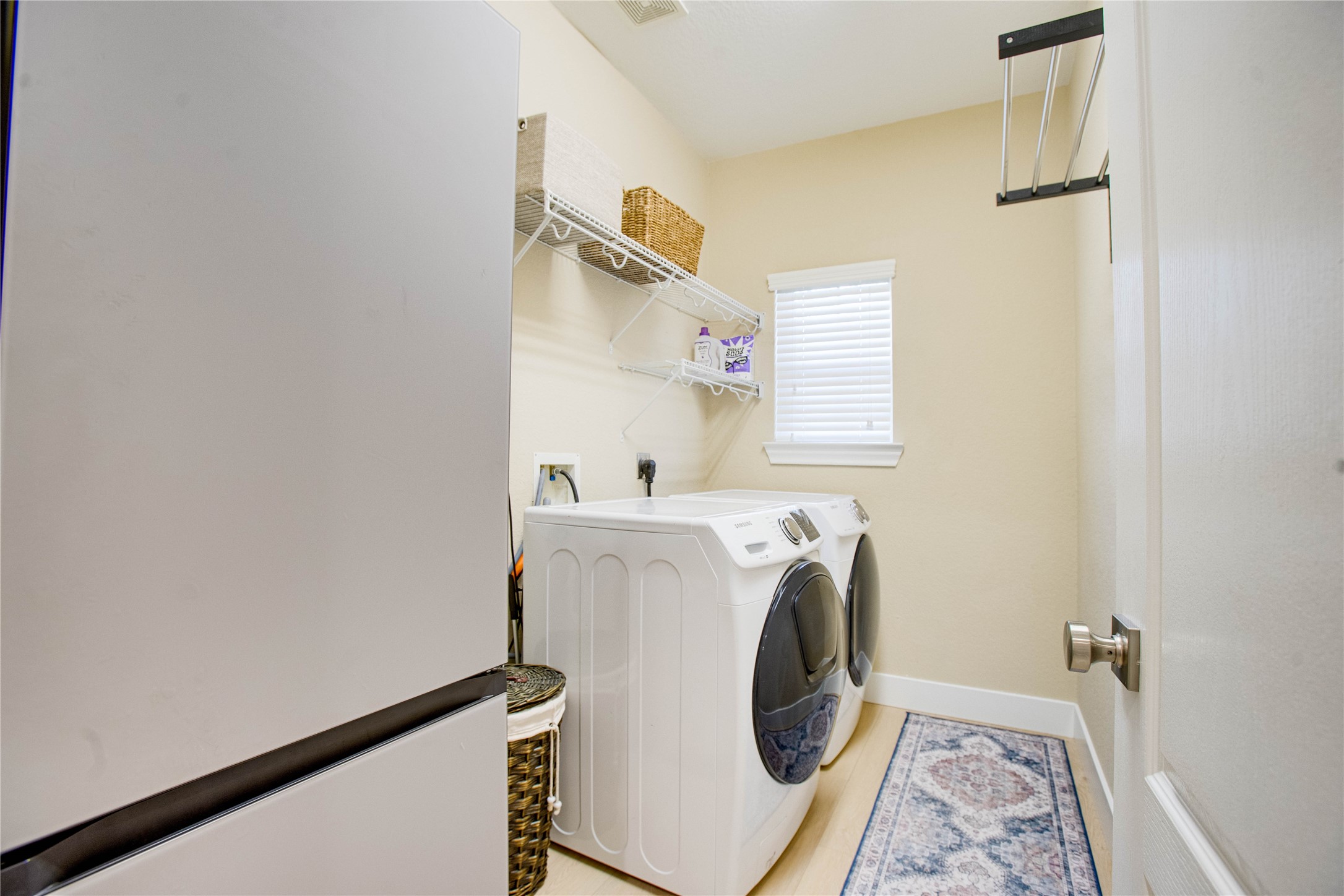 30 Fraiser Fir Place Spring, TX 77389 - Photo 14 of 35 a utility room with dryer and washer
