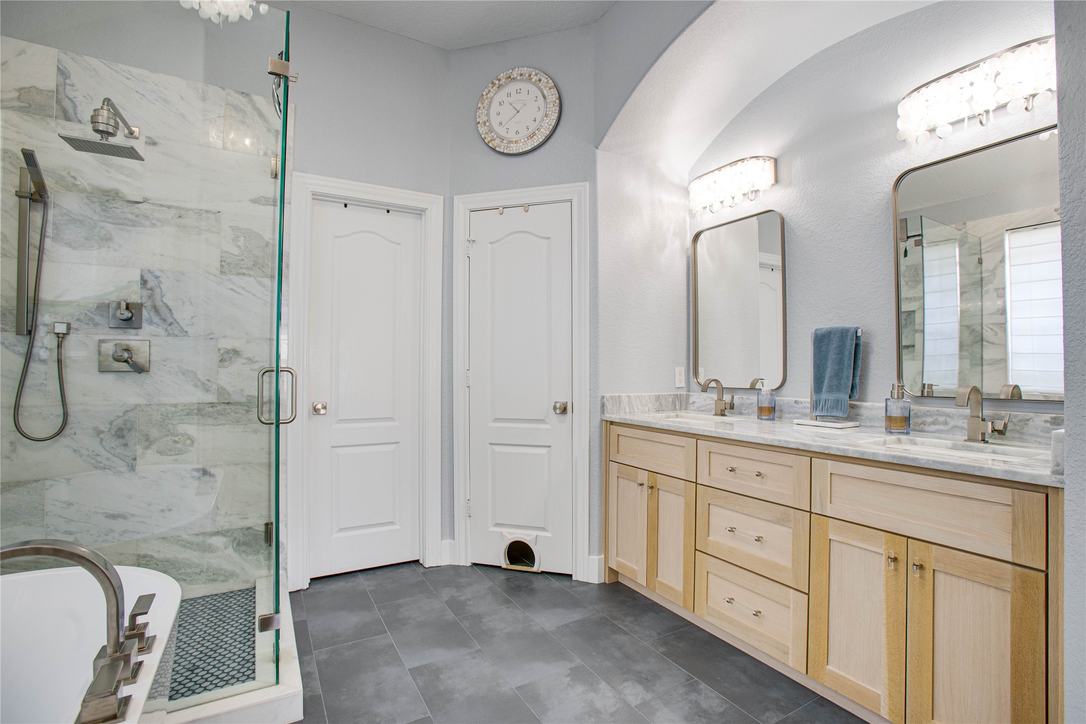 30 Fraiser Fir Place Spring, TX 77389 - Photo 17 of 35 a spacious bathroom with a granite countertop sink mirror and shower