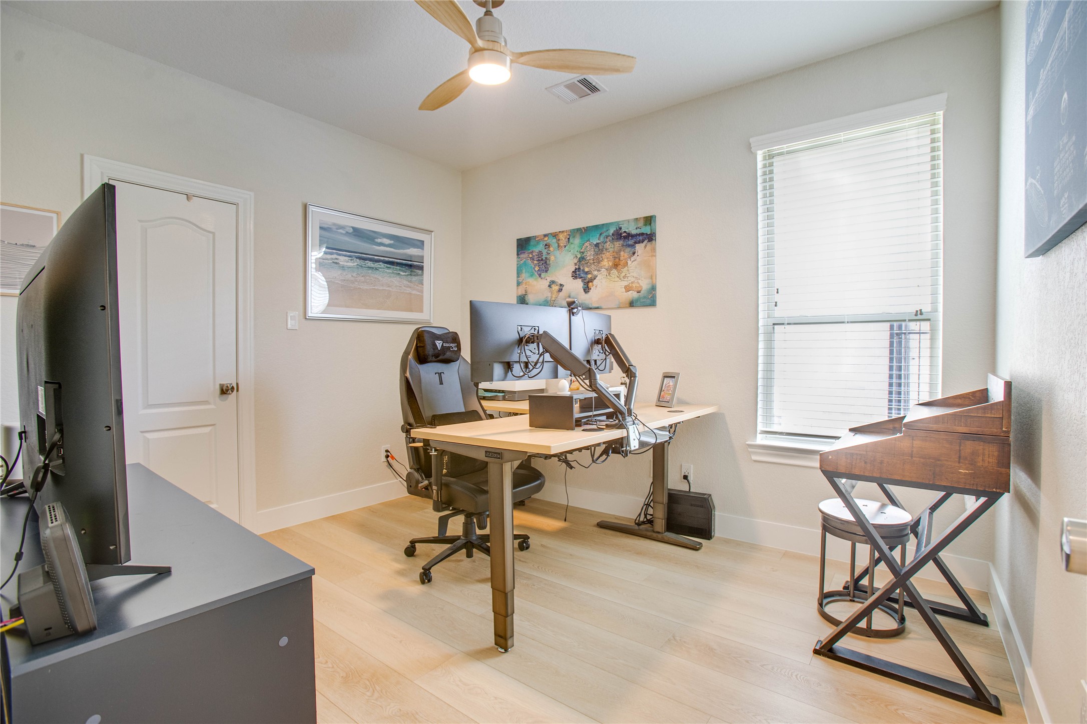 30 Fraiser Fir Place Spring, TX 77389 - Photo 19 of 35 a view of a workspace with furniture and a window