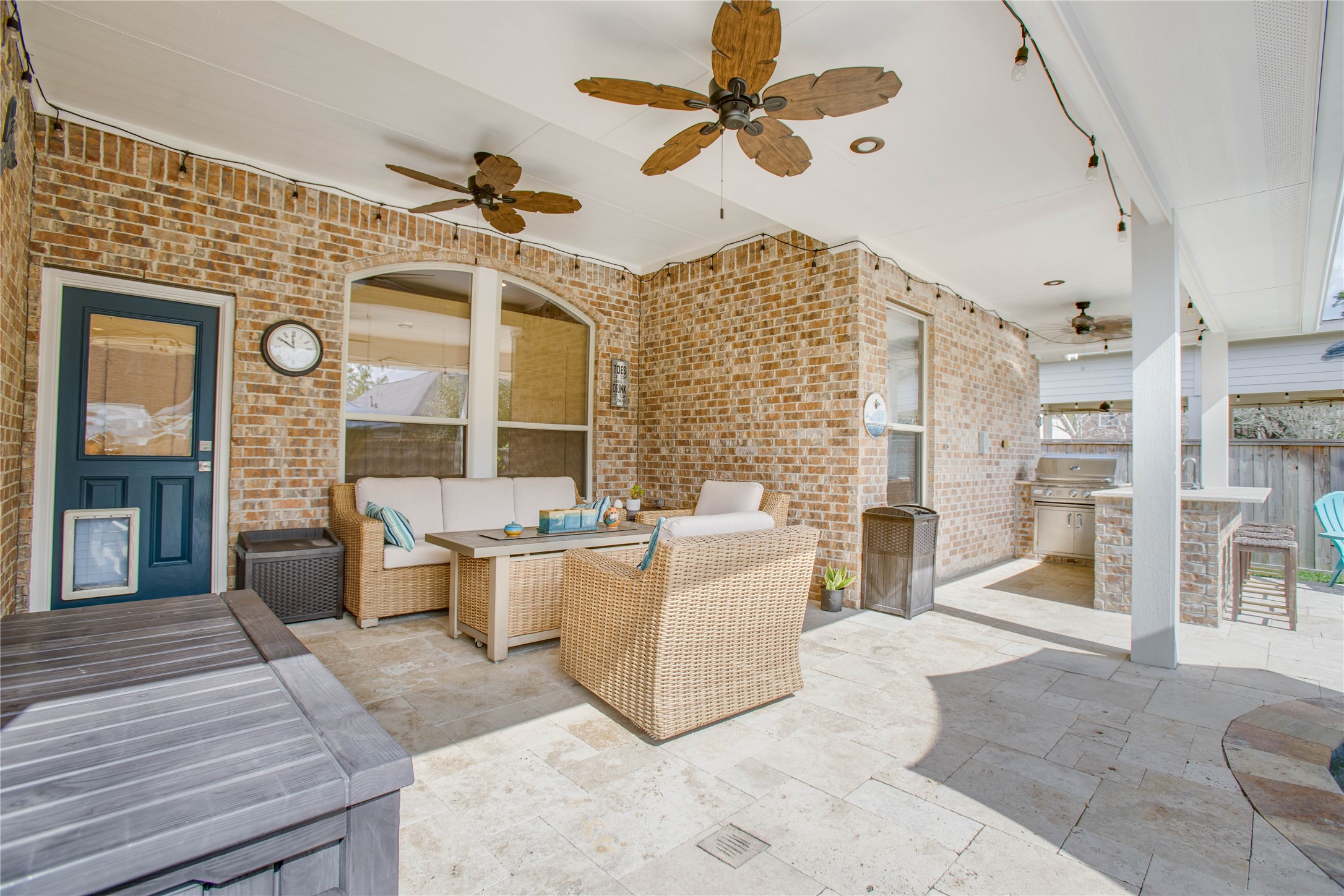 30 Fraiser Fir Place Spring, TX 77389 - Photo 23 of 35 a living room with a couch and a chandelier