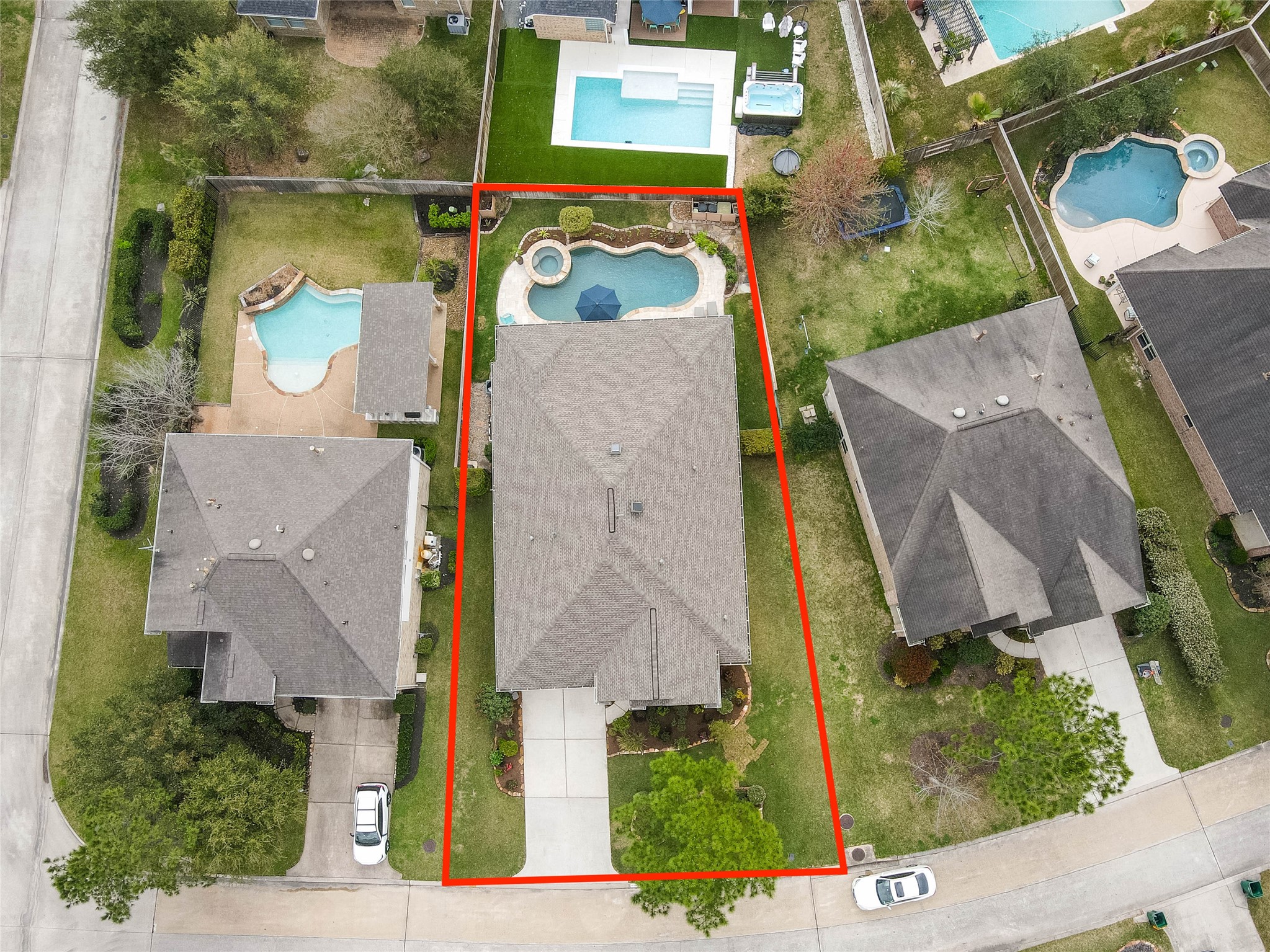 30 Fraiser Fir Place Spring, TX 77389 - Photo 29 of 35 an aerial view of residential house with outdoor space and swimming pool