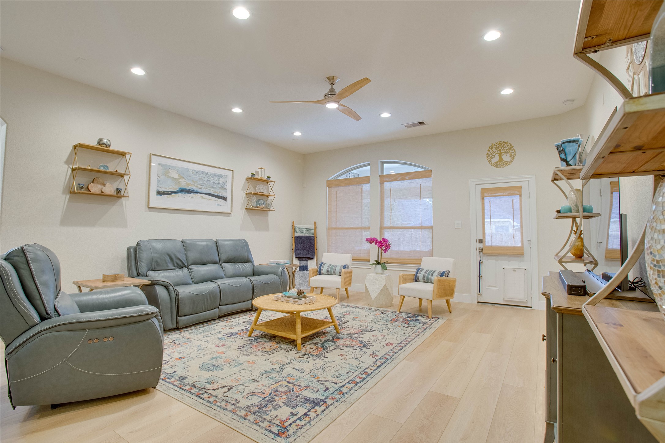 30 Fraiser Fir Place Spring, TX 77389 - Photo 6 of 35 a living room with furniture and a rug