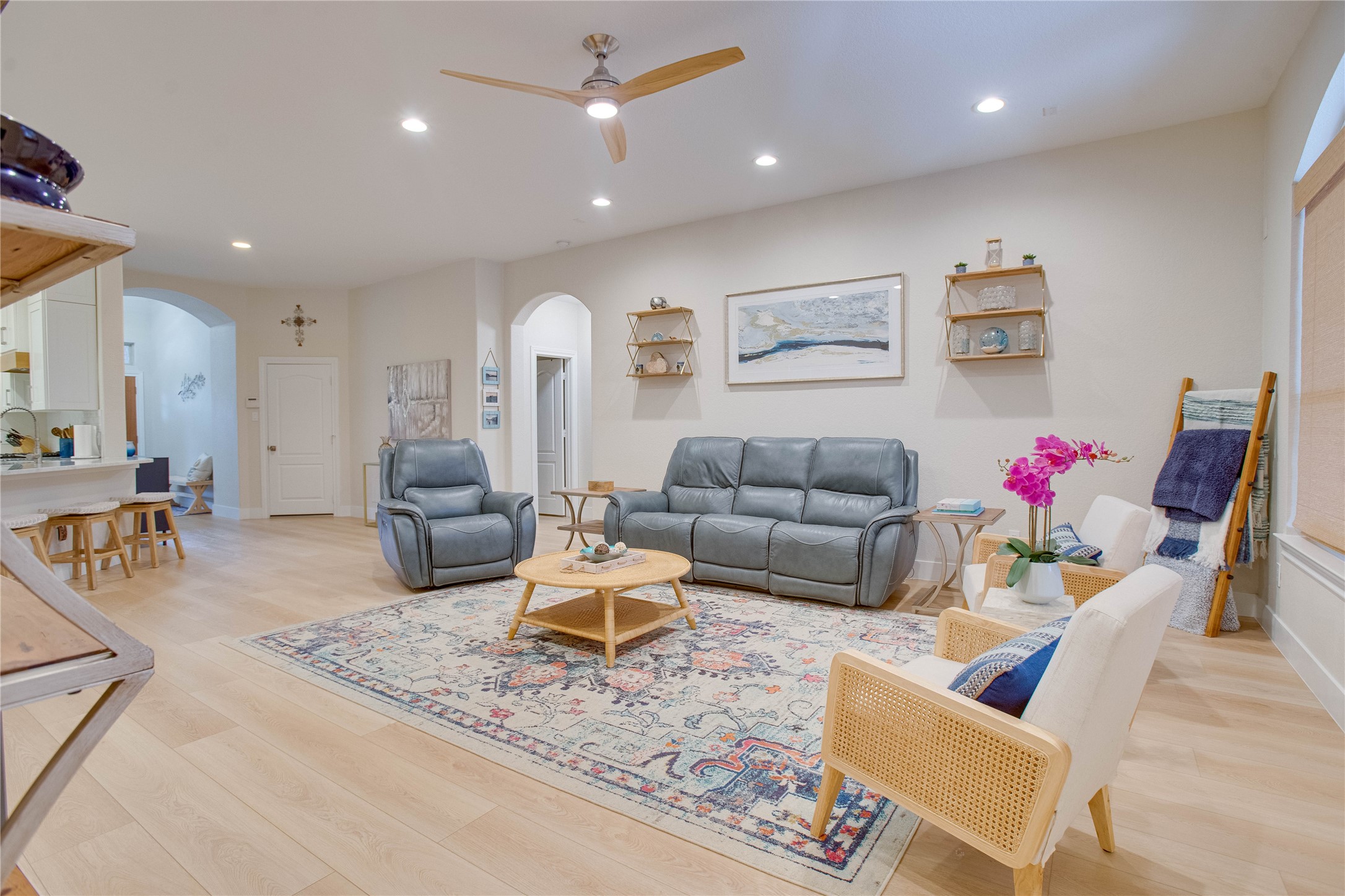 30 Fraiser Fir Place Spring, TX 77389 - Photo 7 of 35 a living room with furniture and kitchen view