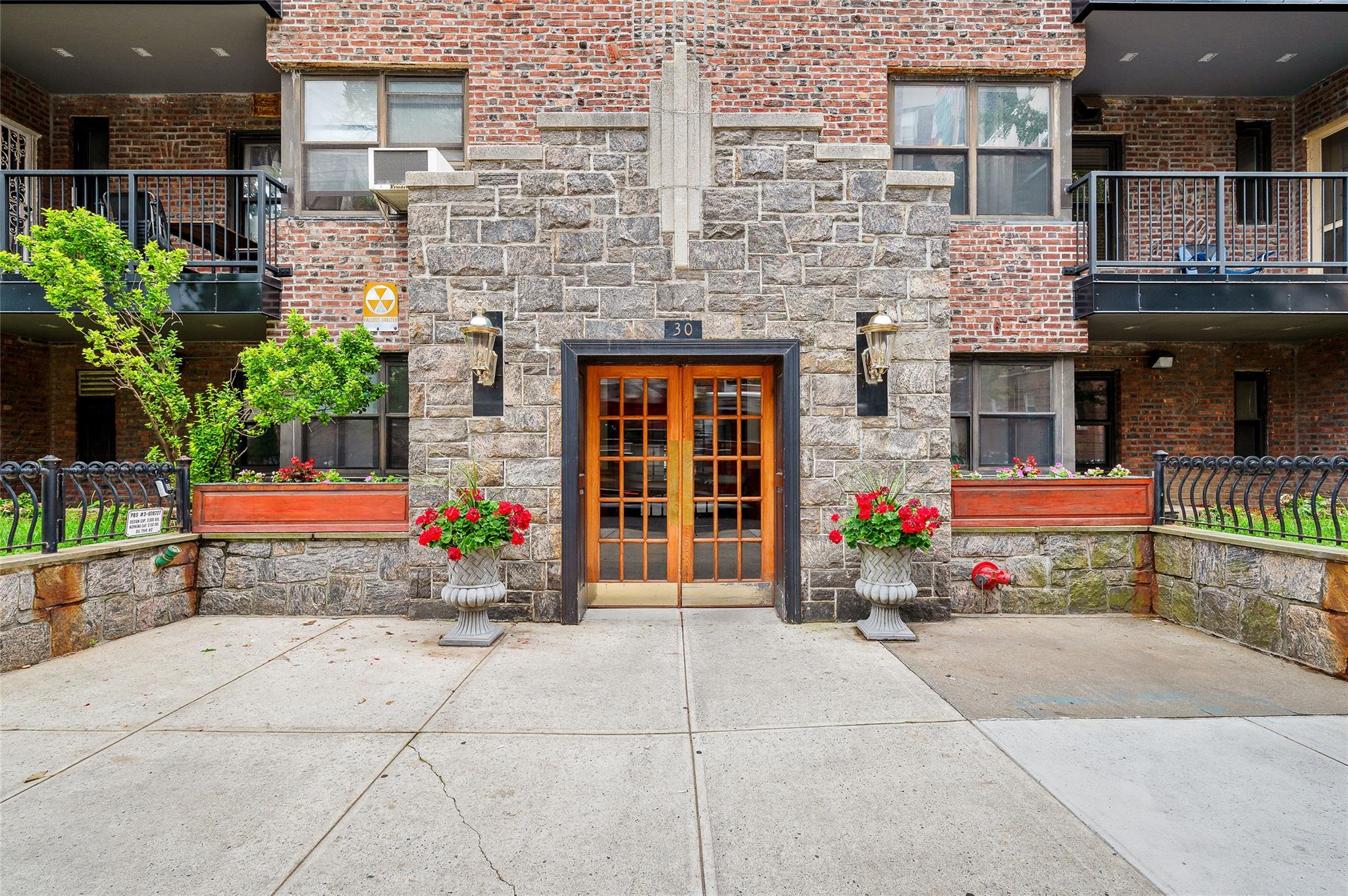 a view of a building with sitting area
