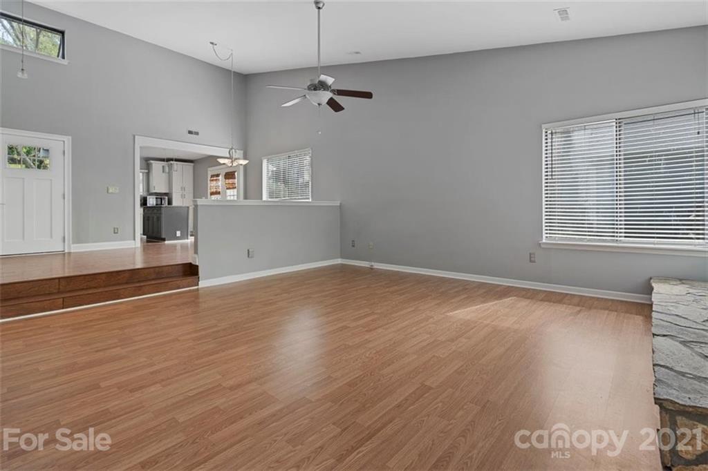 8508 Rittenhouse Circle Charlotte, NC 28270 - Photo 13 of 44 a view of empty room with wooden floor and fan