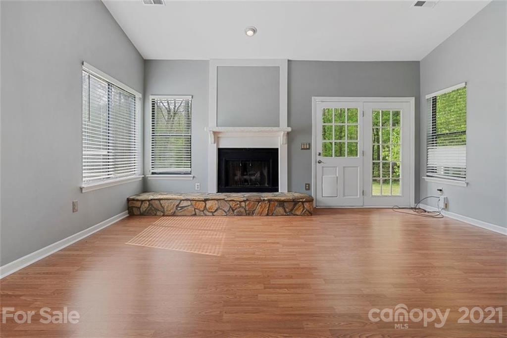 8508 Rittenhouse Circle Charlotte, NC 28270 - Photo 15 of 44 a view of an empty room with window and fire place
