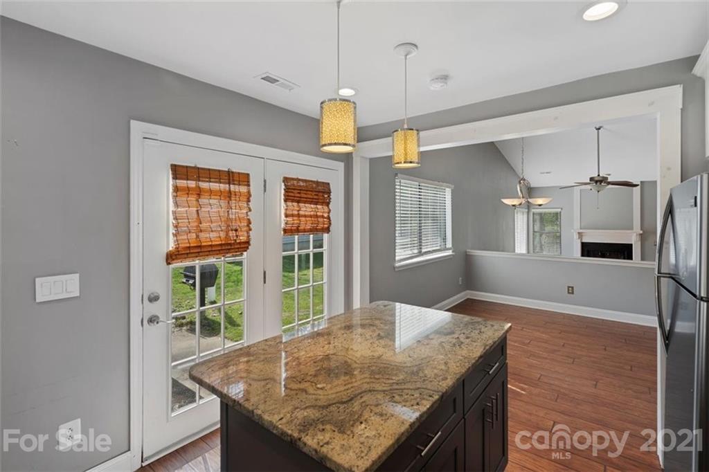 8508 Rittenhouse Circle Charlotte, NC 28270 - Photo 23 of 44 a kitchen with a table and refrigerator