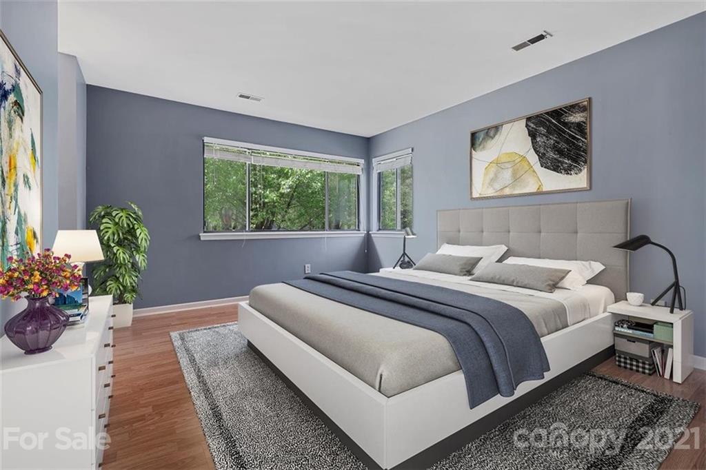 8508 Rittenhouse Circle Charlotte, NC 28270 - Photo 27 of 44 a bedroom with a bed and a couch