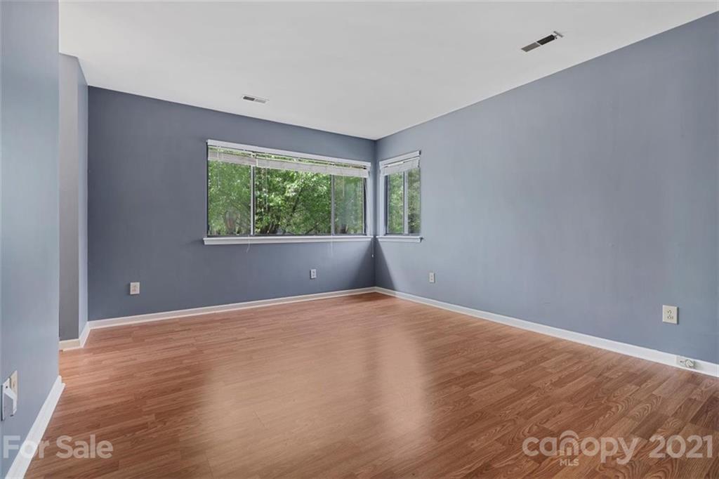 8508 Rittenhouse Circle Charlotte, NC 28270 - Photo 28 of 44 a view of an empty room with wooden floor and a window