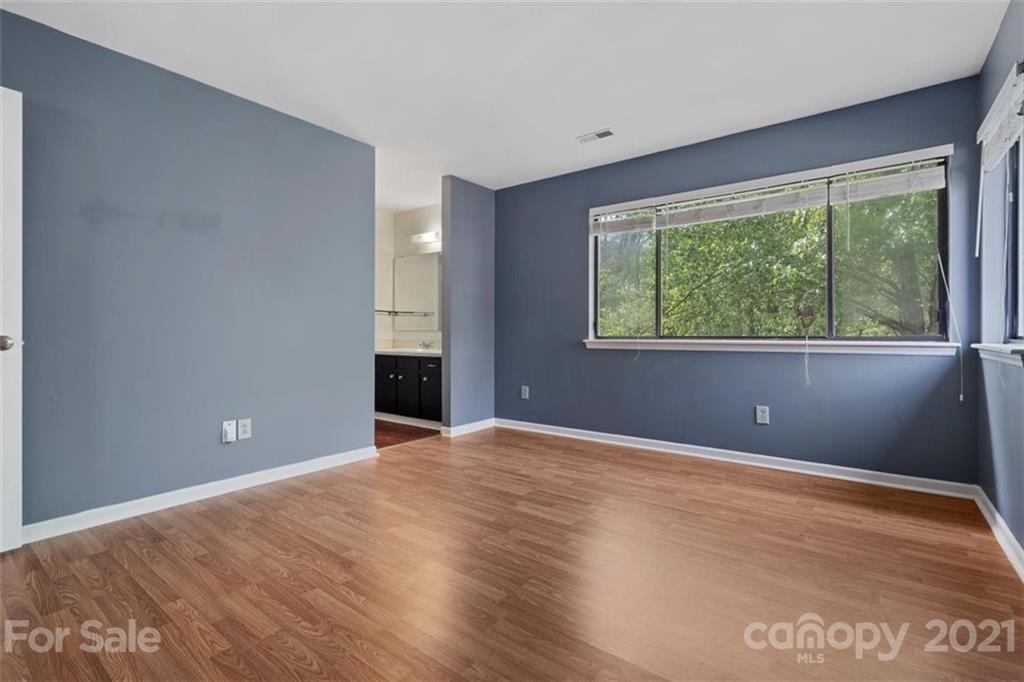 8508 Rittenhouse Circle Charlotte, NC 28270 - Photo 30 of 44 a view of an empty room with wooden floor and a window
