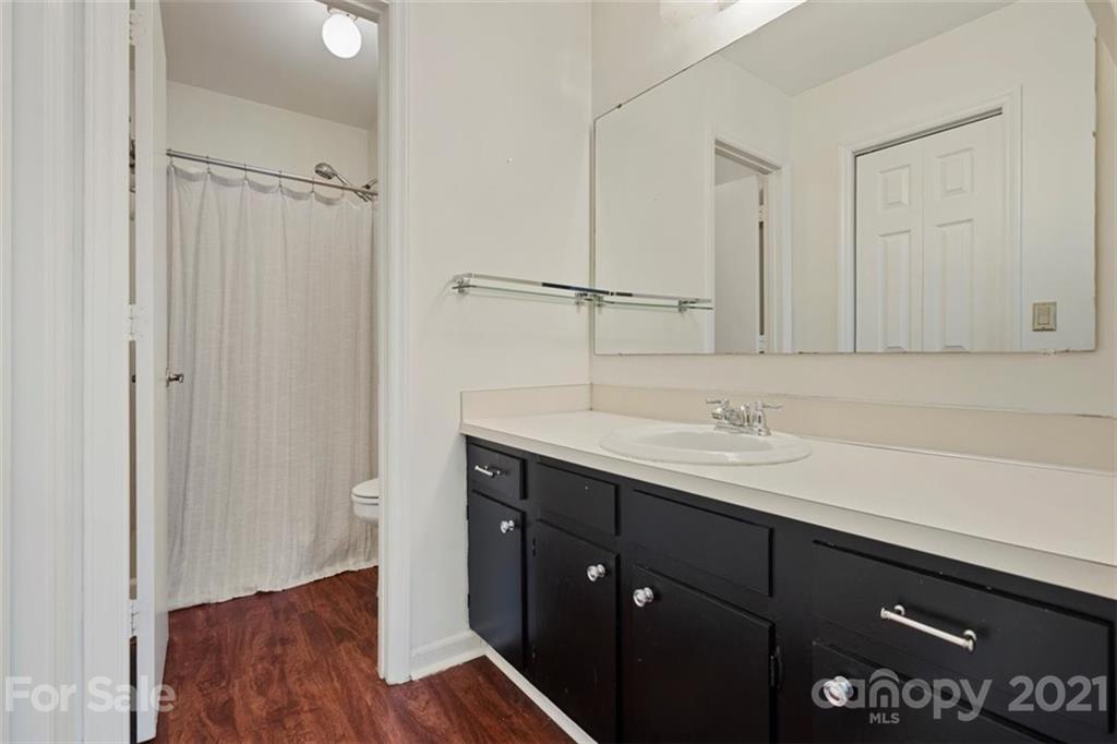 8508 Rittenhouse Circle Charlotte, NC 28270 - Photo 31 of 44 a bathroom with a sink a mirror and shower