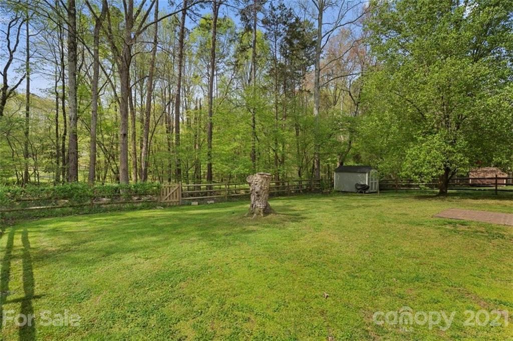 8508 Rittenhouse Circle Charlotte, NC 28270 - Photo 44 of 44 a swimming pool with lots of trees and plants