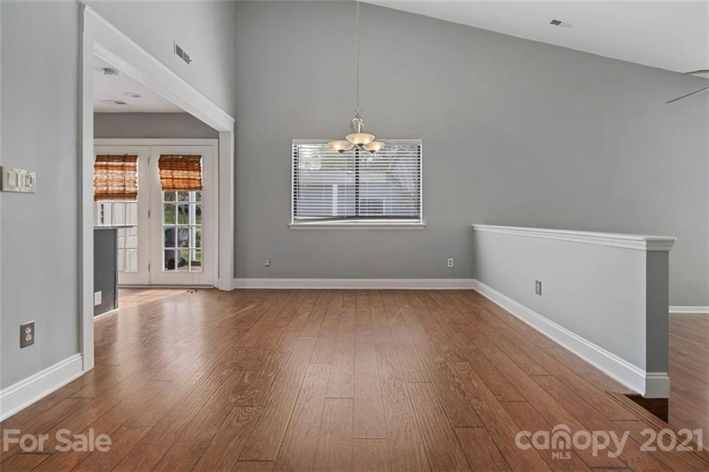 8508 Rittenhouse Circle Charlotte, NC 28270 - Photo 9 of 44 an empty room with wooden floor and windows
