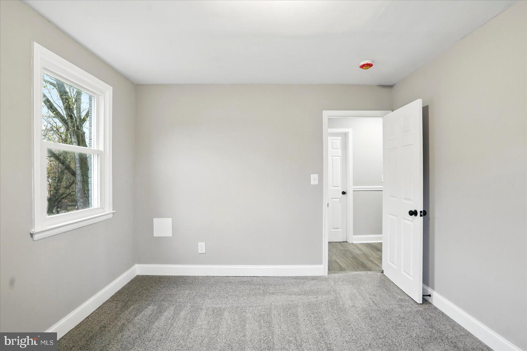 3816 Cherrybrook Road Randallstown, MD 21133 - Photo 12 of 35 an empty room with windows