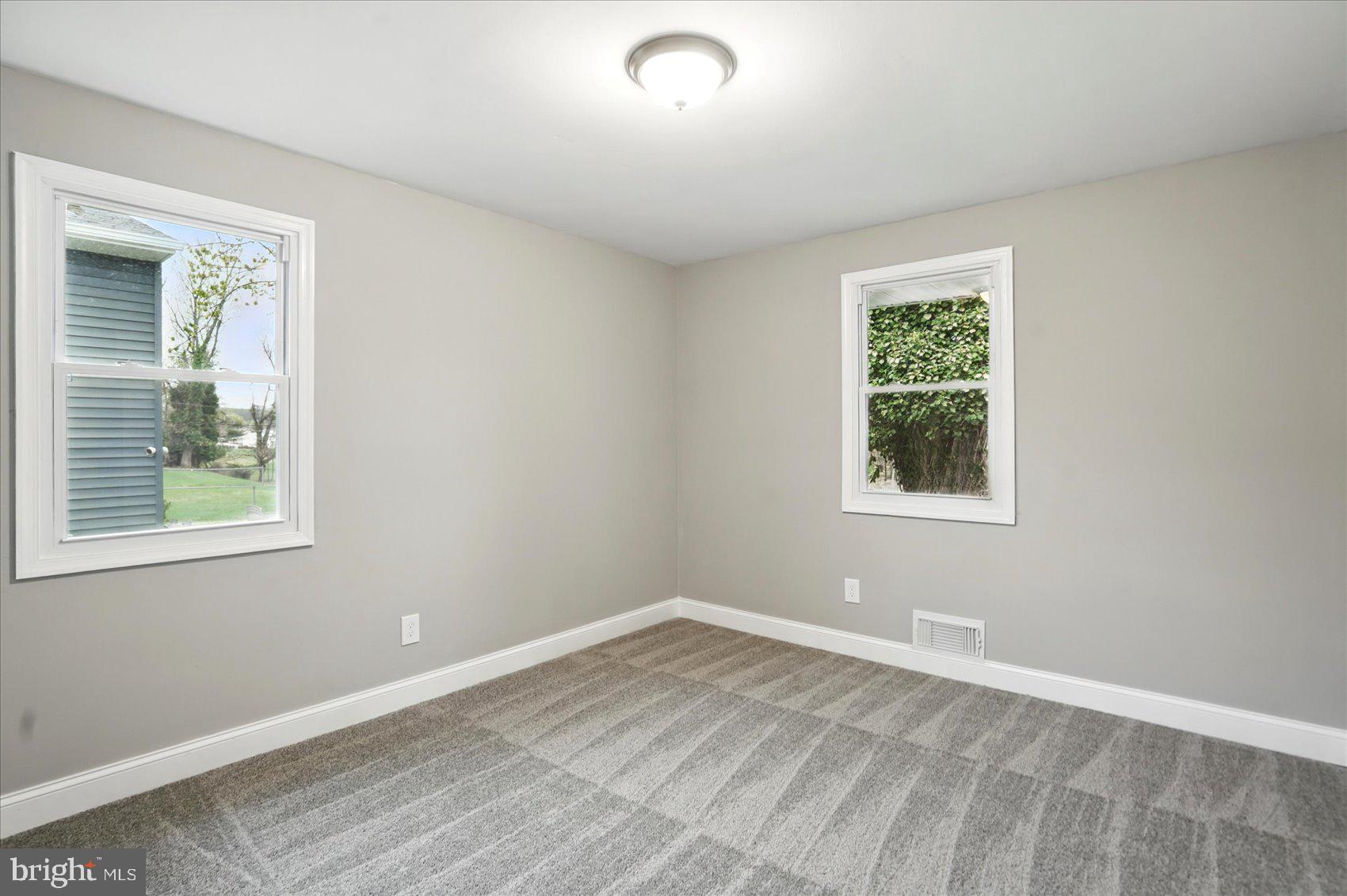 3816 Cherrybrook Road Randallstown, MD 21133 - Photo 13 of 35 an empty room with a window