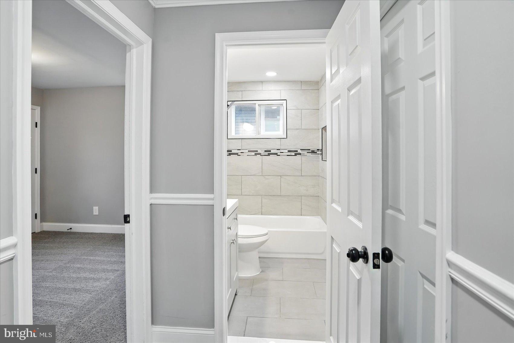 3816 Cherrybrook Road Randallstown, MD 21133 - Photo 15 of 35 a bathroom with a shower