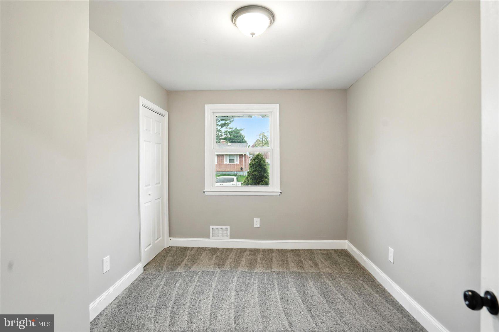 3816 Cherrybrook Road Randallstown, MD 21133 - Photo 17 of 35 a view of a room with wooden floor and window